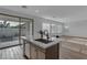 Bright open kitchen with island featuring stainless appliances and eat-in counter at 6434 N 17Th St, Phoenix, AZ 85016