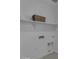 Bright laundry room featuring a shelf, storage basket and convenient utility connections at 6434 N 17Th St, Phoenix, AZ 85016