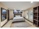 Main bedroom with a modern aesthetic, a decorative wave graphic, and neutral tones at 6611 N 64Th Pl, Paradise Valley, AZ 85253