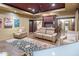 A comfortable home theater room with plush seating, theater lighting, and movie-themed decor at 6611 N 64Th Pl, Paradise Valley, AZ 85253