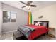 Comfortable bedroom features carpet floors, ceiling fan and window for great natural light at 7604 N 46Th Ave, Glendale, AZ 85301