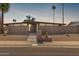 Stunning mid-century modern home with well maintained desert landscaping and a private, enclosed front yard at 7604 N 46Th Ave, Glendale, AZ 85301