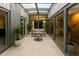 Bright sunroom features tile flooring, skylights, and sliding glass doors, creating an indoor-outdoor living space at 7604 N 46Th Ave, Glendale, AZ 85301