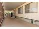 Spacious carport featuring lattice and an adjacent storage shed with a private entry at 7807 E Main St # Cc-71, Mesa, AZ 85207