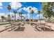 Inviting community common area with picnic tables and a charming fire pit, ideal for outdoor gatherings and relaxation at 7807 E Main St # Cc-71, Mesa, AZ 85207