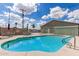 Inviting community pool with sun loungers and dining, surrounded by well-maintained landscaping, creating a relaxing atmosphere at 7807 E Main St # Cc-71, Mesa, AZ 85207