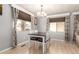 Inviting dining space with a modern table set and patterned curtains at 7807 E Main St # Cc-71, Mesa, AZ 85207