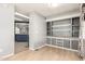 Open dining area with built-in cabinets and a view into the kitchen at 7807 E Main St # Cc-71, Mesa, AZ 85207
