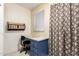 Home office features a built-in desk with drawers, a chair, and natural light from a window at 7807 E Main St # Cc-71, Mesa, AZ 85207