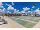 Shuffleboard courts with vibrant green surfaces and clearly marked numbers, perfect for outdoor community recreation at 7807 E Main St # Cc-71, Mesa, AZ 85207