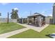 This backyard features a cozy gazebo and shed, perfect for outdoor relaxation and storage at 8111 E 5Th Ave, Mesa, AZ 85208