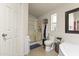 Bright bathroom with a shower, bathtub, toilet, and tiled flooring at 8111 E 5Th Ave, Mesa, AZ 85208