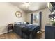 This cozy bedroom features stylish decor and a comfortable bed, perfect for relaxation at 8111 E 5Th Ave, Mesa, AZ 85208