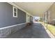 This exterior carport provides ample parking space, with a backyard view at 8111 E 5Th Ave, Mesa, AZ 85208