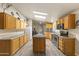 The kitchen has plentiful counter space, modern appliances, and natural lighting at 8111 E 5Th Ave, Mesa, AZ 85208