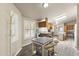 Bright eat-in kitchen with natural light, modern finishes, and updated appliances at 8111 E 5Th Ave, Mesa, AZ 85208