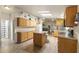 Spacious kitchen with an island, plenty of cabinets and counter space, perfect for entertaining at 8111 E 5Th Ave, Mesa, AZ 85208