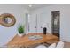 Bright office featuring wood desk, modern decor, and white walls with contrasting flooring at 8300 E Dixileta Dr # 306, Scottsdale, AZ 85266