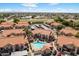 Aerial view showing community pool and outdoor areas for condo complex at 839 S Westwood -- # 154, Mesa, AZ 85210