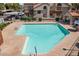 Swimming pool offers a clean, inviting community space with steps and railings for easy access at 839 S Westwood -- # 154, Mesa, AZ 85210