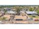 Aerial view of property with a spacious dirt backyard and perimeter walls at 875 E Flint St, Chandler, AZ 85225