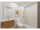 Well-lit bathroom featuring a stand-up shower, a vanity with marble countertop, and modern fixtures at 875 E Flint St, Chandler, AZ 85225