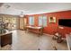 Spacious dining area with tiled floors, cozy seating, and sliding door access to the patio at 901 E Hearn Rd, Phoenix, AZ 85022