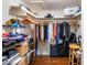 Walk-in closet with storage, clothing rack, shelving, and suitcases at 901 E Hearn Rd, Phoenix, AZ 85022