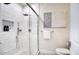 Contemporary bathroom featuring a glass-enclosed shower with subway tile and modern fixtures at 921 W Willetta St, Phoenix, AZ 85007