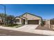 Attractive stucco home with well-maintained landscaping, concrete drive, and easy street access at 94 S 189Th Ln, Buckeye, AZ 85326