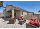 Inviting outdoor living area with patio furniture, providing a comfortable space to unwind at 94 S 189Th Ln, Buckeye, AZ 85326