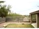 Well-maintained backyard showcasing desert landscaping and providing a private outdoor retreat at 10399 E Hillery Dr, Scottsdale, AZ 85255