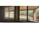 Bright view showcasing the backyard, visible through a large window at 10399 E Hillery Dr, Scottsdale, AZ 85255