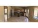 Cozy kitchen and eat-in nook area with tile flooring and plenty of natural light at 10399 E Hillery Dr, Scottsdale, AZ 85255
