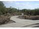 Community walking path surrounded by native desert vegetation, encouraging outdoor activities and exploration at 10399 E Hillery Dr, Scottsdale, AZ 85255