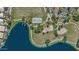 Beautiful aerial view of park with basketball court, lake and lush green landscaping at 1135 W Sea Fog Dr, Gilbert, AZ 85233