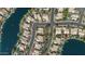 Overhead view of a waterfront community, showcasing homes with private pools and boat docks at 1135 W Sea Fog Dr, Gilbert, AZ 85233