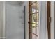 Bathroom features a shower stall and a glass door leading to the outside at 1135 W Sea Fog Dr, Gilbert, AZ 85233