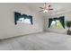 Spacious bedroom featuring carpet floors, high ceilings, large windows and natural light at 1135 W Sea Fog Dr, Gilbert, AZ 85233