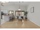 Inviting dining area with views of kitchen, with stylish lighting and a spacious open floor plan at 1135 W Sea Fog Dr, Gilbert, AZ 85233