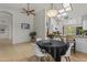 Open-concept living space with dining area, featuring lots of natural light and views into the kitchen at 1135 W Sea Fog Dr, Gilbert, AZ 85233