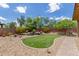 Landscaped backyard with putting green area, perfect for outdoor recreation at 13720 N 148Th Dr, Surprise, AZ 85379