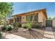Charming single-story home with stone accents, desert landscaping, and a two-car garage at 13720 N 148Th Dr, Surprise, AZ 85379