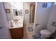 Bathroom featuring a double sink vanity, walk-in shower and blue accent rugs at 16021 N 30Th St # 127, Phoenix, AZ 85032