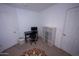 Bright bedroom with a desk, cube storage and neutral decor at 16021 N 30Th St # 127, Phoenix, AZ 85032