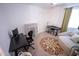 Versatile bedroom space including a desk, chair, cube storage, and seating area, creating a functional home office at 16021 N 30Th St # 127, Phoenix, AZ 85032