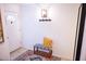 Cozy entryway with decorative bench, patterned rug, and stylish light fixture at 16021 N 30Th St # 127, Phoenix, AZ 85032