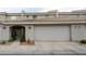 Charming townhome featuring a tile roof, two-car garage, and low-maintenance landscaping at 16021 N 30Th St # 127, Phoenix, AZ 85032