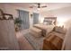 Bedroom showcasing a neutral color palette, blue curtains, and a cozy atmosphere at 16021 N 30Th St # 127, Phoenix, AZ 85032