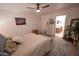 Bright main bedroom featuring a calming decor, ensuite bathroom and neutral carpet at 16021 N 30Th St # 127, Phoenix, AZ 85032